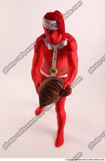 JOEL_ADAMSON CHRISTMAS VILLAIN WITH BAG